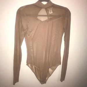 See trough body suit